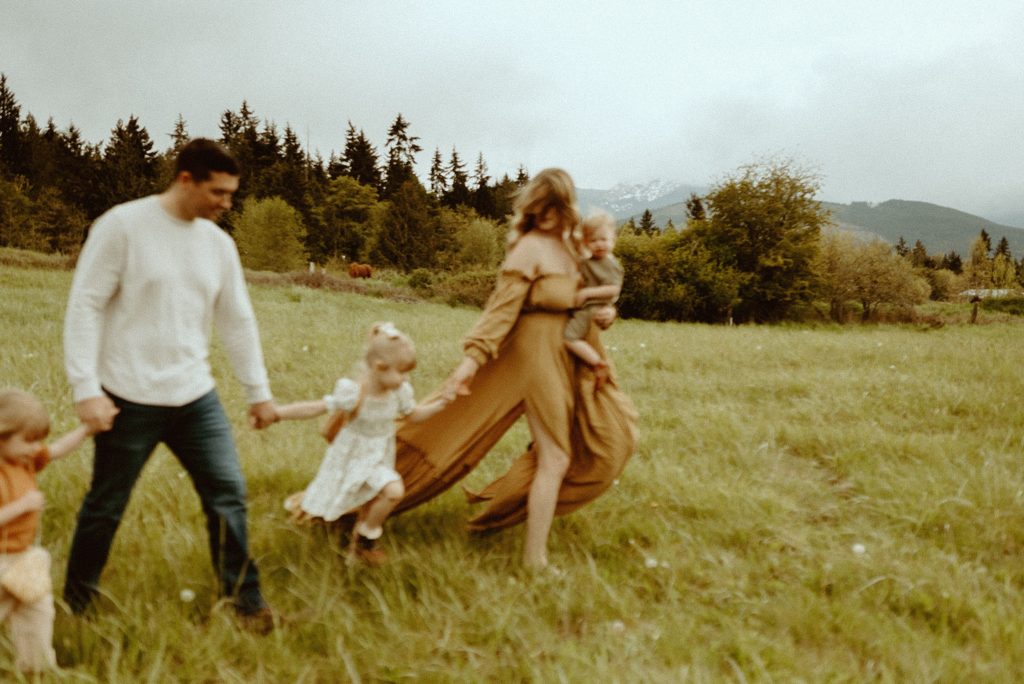 family walking on grass