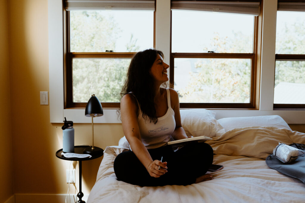 Bride getting ready at waterfront Airbnb in Bow Washington