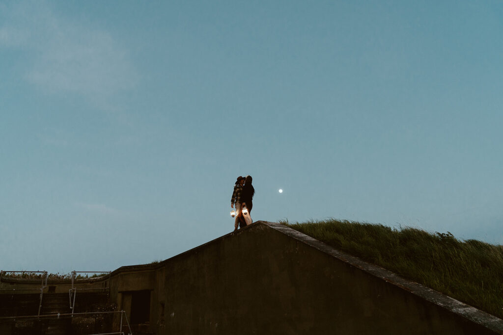 couple on top of fort worden military bunker